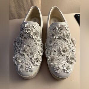 Women’s Michael Kors white beaded floral slip on sneakers